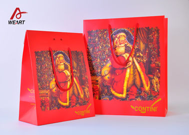Porcellana Sacchi di carta svegli di qualità superiore di Natale di colore rosso con la laminazione della metallina delle maniglie fornitore