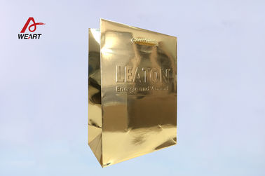 Porcellana Sacchetti della spesa brillanti su misura della carta della laminazione di Glod con la maniglia brillante dell&#039;oro fabbrica